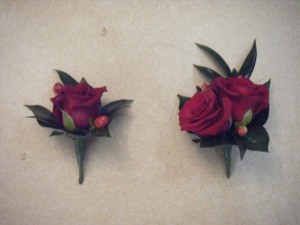 burgondy_rose_buttonholes_with_berries